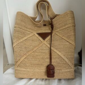 Prada large raffia tote with brown  leather trim, open top, & removable pouch